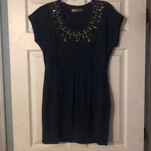 Navy dress/tunic with details around the neck